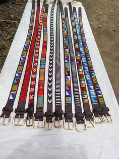 African beaded belt, Maasai belts, best gifts for birthday, Christmas gifts, mother's day and fathers day 100% handcrafted belt using fine beads and leather For any questions please send me a  message We ship via DHL express Adjustable Artisan Multicolor Belt, Traditional Handmade Multicolor Belts, Adjustable Handmade Multicolor Belt, Traditional Brown Belt For Festivals, Adjustable Artisan Belts For Gifts, Adjustable Artisan Belt As Gift, Handmade Artisan Belts For Gifts, Artisan Adjustable Belts As Gifts, Traditional Adjustable Fabric Belt