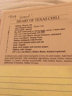 a close up of a piece of paper with some type of food on it and the words heart of texas chili