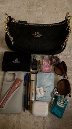 Coach bag ♡ Vivienne westwood ☆ #whatsinmybag #inspo Bag Contents, What's In My Purse, Coach Tote Bag, Baggu Bags, Makeup Bag Essentials, Essentials Aesthetic