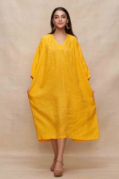 Yellow linen kaftan style dress in a solid fabric base. - Aza Fashions Relaxed Fit Split Neck Dress, Yellow V-neck Relaxed Fit Dress, Yellow Relaxed Fit V-neck Dress, Traditional Yellow V-neck Maxi Dress, Kaftan Style Dresses, Kaftan Style, Kaftan Dress, Free Size, Aza Fashion