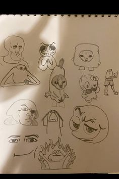 an image of cartoon faces drawn on paper