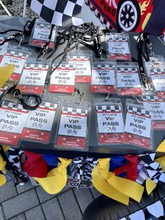 a table topped with lots of tags and ribbons