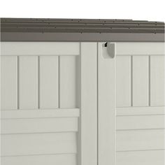 a white storage shed with two doors open