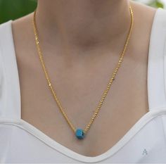 Handmade 14k Gold Turquoise Necklace for Women, 14k Gold Necklace for Women This beautiful modern detailed necklace is 14K Gold with trendy and minimalist design that comes with a little turquoise cubic stone as pendant. This is a great gold necklace for everyday use, but also good for special occasions like weddings. Length of chain is 50 cm, and its weight is 2 grams. Weight: 2 gr Length: 50 cm Since this is a handmade product there might be slight changes like its weight may differ by ±10%. T Turquoise Necklace For Everyday Elegance, Elegant Turquoise Necklace For Everyday Wear, Elegant Turquoise Necklace For Everyday, Elegant Turquoise Necklace With Delicate Chain For Gift, Modern Turquoise Necklace For Gift, Minimalist Turquoise Gemstone Necklace, Minimalist Turquoise Necklace, Necklace For Everyday, Gold Necklace For Women