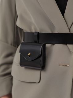 Made in a modern and minimalist aesthetic, the Micro Belt Bag is not only a fashion accessory but also a functional one. Although small, the stylish bag can hold your keys, coins or other small items. With its versatile design, the leather belt bag can be worn with a sporty jumpsuit for an edgy outfit or with a blazer for a chic, elegant look. Bag Size: Height- 7 cm, Width- 8 cm, Depth – 1.5 cm Waist belt width: 3 cm Adjustable using the buckle Designed to be fitted on the waist Unique Bags Design, Waist Bags For Women, Waist Bag Leather, Edgy Outfit, How To Tie Shoes, Waist Purse, Collection Ideas, Micro Bag, Leather Waist Bag