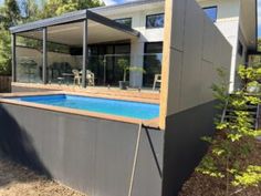 a house with a swimming pool in the backyard