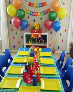 a table set up for a birthday party