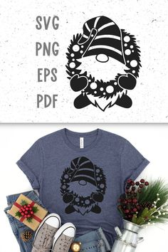 a t - shirt and some christmas decorations on top of a pile of clothes with the words svg png epss df