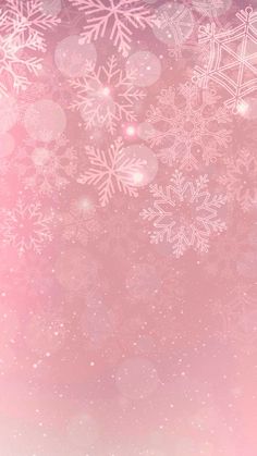 a pink background with white snowflakes on it