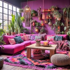 a living room filled with lots of colorful furniture and potted plants on the wall