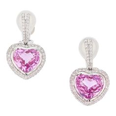 These earrings are made of 18k white gold and features two heart shape pink topaz weighing 13.20ct prong set. The earrings also feature round cut diamonds weighing 1.35cts, prong set. Diamond Heart Earrings, Zipper Jewelry, Pink Heart Earrings, Pink Topaz, Rose Cut Diamond, Diamond Heart, Round Cut Diamond, Heart Earrings, Pink Heart