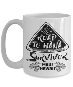 a white coffee mug with the words road to hale survivor and mau hawaii on it