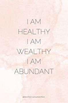 the words i am healthy are written in black and white on a pink watercolor background