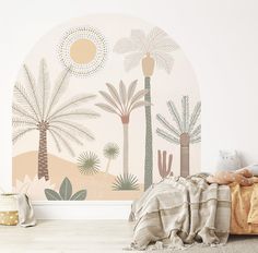 a bedroom with palm trees painted on the wall and a bed in front of it