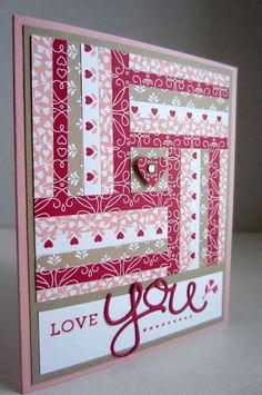 a close up of a card with the words love you on it and a heart