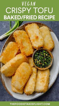 fried tofu on a plate with dipping sauce