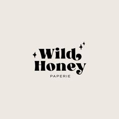 the wild honey paperie logo is black and white with stars on it's side