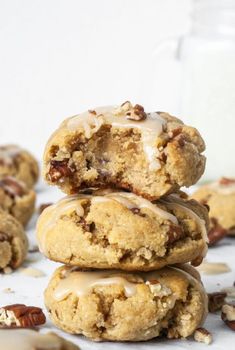 three cookies stacked on top of each other with the words paleo maple pecan cookies