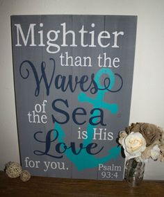 a wooden sign that says, mightier than the waves of the sea is love for you