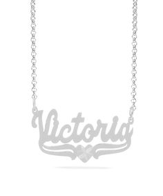 This Name Pendant with Diamond cut "Victoria" is available in either: Silver Plated Gold Plated Sterling Silver and 14K Gold over Sterling Silver. You can choose up to 10 characters (Letters only, NO numbers or special characters).Finished with diamond cuts on heart. Customized Silver Necklace With Heart Pendant, Customized Silver Necklaces With Heart Pendant, Customizable White Heart Pendant Necklace, Elegant Customized Silver Heart Necklace, Elegant Silver Heart Nameplate Necklace, Customizable White Gold Necklace For Valentine's Day, Silver Cuban Chain, Monogrammed Cuff, Monogrammed Cufflinks