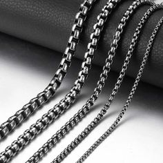 Elevate your style with our Men's Chain, a bold and rugged accessory crafted from durable gunmetal-colored stainless steel, designed to make a strong and distinctive statement. Description Men’s Chain Gunmetal Color Stainless Steal Trendy / Casual Style Size 18-36 inches Width 2mm, 3mm, 4mm, or 6mm Necklaces For Men, Stainless Steal, Round Box, Men's Necklace, Chains For Men, Box Chain, Men Necklace, Ring Set, Chains Necklace