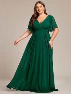 Make a statement at your next wedding or formal event with our Plus Size Chiffon A-Line Double V-Neck Empire Waist Bridesmaid Dress. The soft chiffon fabric and flowing A-line shape provide comfort and ease of movement, while the empire waist and double V-neckline create a flattering silhouette. Perfect for a curvy figure, this dress is available in a range of sizes to ensure the perfect fit. Whether you're attending a black-tie event or a beach wedding, this dress is sure to turn heads. Fit: Pl Flowerless Wedding, Quencinera Dresses, Skimpy Dresses, Quincenera Dresses, Dark Green Bridesmaid Dress, Empire Waist Bridesmaid Dresses, Empire Waist Gown, Chiffon Shorts, Maxi Bridesmaid Dresses