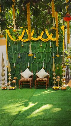 an outdoor area decorated with yellow and white decorations