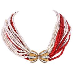 Fabulous elegant necklace created by Mario Buccellati in Italy in the 1950's. Features ten strands of white freshwater pearls and six strands of Mediterranean coral connected with a diamond and yellow & white gold clasp. The necklace has a lot of volume and can be worn with the clasp either on the back (more casual look) or on front/side (dressier look). The clasp is made of 18k yellow gold and white gold and set with twenty six round cut diamonds. Beach Jewelry Boho, Black Beaded Jewelry, Clasp Necklace, Elegant Necklace, White Freshwater Pearl, Pearl Diamond, Elegant Necklaces, Multi Strand Necklace, Look Plus