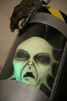 a close up of a mask on top of a machine