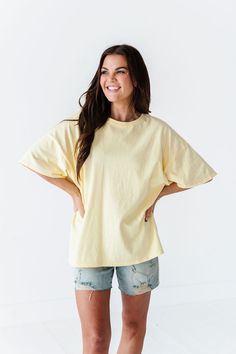 Features Round Neck Short Sleeves Pastel Yellow Color 100% Cotton Size + Fit Small 0-4, Medium 4-8, Large 8-12 Kristin is 5'4", a size 1 and is wearing a Small Oversized fit, size down if you want less oversized. Above recommendation is for an oversized fit. Click here for shorts in photos Click here for shorts in Aimee's try on video Curvy Swim, Curvy Dress, Resort Collection, Black Sand, Boyfriend Tee, Pastel Yellow, Swim Bottoms, Mommy And Me, Skirt Pants