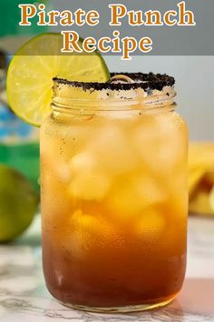 a close up of a drink in a mason jar