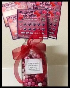 valentine's day candy in a jar with red ribbon