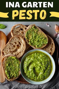 pesto in a bowl on bread with garlic and basil leaves next to it, text overlay reads ina garten pesto