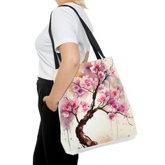 I am using a mockup for illustrative purposes. Actual product may be slightly different than the photos based on computer monitor settings and human placement of graphic.  This practical, high-quality Cherry Blossom Tote Bag is available in a large size so you can carry everything they need.   Made from reliable materials, lasting for seasons. .: 100% Polyester .: Boxed corners .: Black inner stitching, transparent thread on hems. .: Black cotton handles .: With non-woven laminate inside .: Length 17.99 inches, Height 18.99 inches, Width 0.31 inches .: Assembled in the USA Care instructions:  Remove all items from the bag before cleaning. Pretreat visible stains with a stain remover. Mix warm water with laundry detergent and clean the bag with a terry washcloth or soft bristle brush. Air D Artistic Bags For Everyday Use In Spring, Artistic Tote Bags For Spring, Artistic Spring Tote Bag, Artistic White Shoulder Bag Gift, Artistic White Shoulder Bag For Gift, Artistic White Shoulder Bag As Gift, Bristle Brush, Soft Bristle Brush, Stain Remover