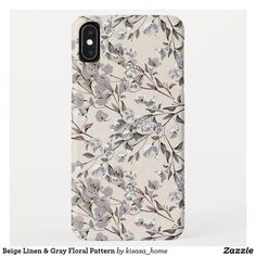 an iphone case with flowers and leaves on the back, is shown in grey tones