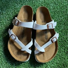 New Without Tags/Box White Comfortable Sandals For Summer Outings, Comfortable White Sandals For Summer Outings, White Footbed Sandals With Single Toe Strap For Beach, White Single Toe Strap Footbed Sandals For Beach, White Single Toe Strap Beach Footbed Sandals, Casual White Footbed Sandals With Single Toe Strap, White Casual Footbed Sandals With Single Toe Strap, Vacation Leather Footbed Sandals With Round Toe, White Sandals With Cork-bed Midsoles And Adjustable Fit