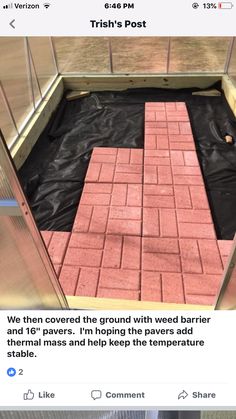 an instagramted photo of a pink brick walkway being installed in a glass enclosure