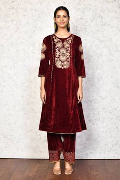 Maroon kurta with floral embroidered motifs and cutwork sleeves. Paired with embroidered hem palazzo.
Components: 2
Pattern: Embroidered
Type Of Work: Floral
Neckline: Round
Sleeve Type: Long
Fabric: Velvet
Color: Maroon
Other Details: 
Length:
Kurta: 44 inches
Pant: 40 inches
Occasion: Sangeet - Aza Fashions Festive Anarkali Palazzo Set With Floral Embroidery, Anarkali Traditional Wear With Floral Embroidery For Festive Season, Traditional Embroidered Palazzo Set For Reception, Festive Anarkali Traditional Wear With Floral Embroidery, Transitional Designer Wear Sets With Floral Embroidery, Festive Floral Embroidered Palazzo Set With Straight Kurta, Festive Salwar Kameez With Floral Embroidery, Embroidered Palazzo Set For Reception And Festivals, Festive Palazzo Set With Floral Embroidery For Reception