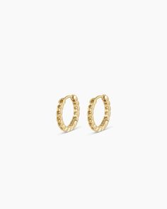 This pair of gold huggie hoop earrings is crafted from solid gold, making them a timeless and luxurious addition to any jewelry collection. Perfect for stacking or to wear alone, these solid gold hoops provide long-lasting shine. Wear yours stacked with other diamond huggie hoop earrings and studs. Wilder Huggies Earring in 14k Solid Gold, Women's by gorjana Luxury 14k Gold Silver Diamond Earrings, Luxury Yellow Gold Huggie Jewelry, Stackable 14k Gold Huggie Earrings For Anniversary, 14k Gold Stackable Huggie Earrings As A Gift, Elegant Stackable 14k Gold Earrings, Small Hoop Stackable Fine Jewelry Earrings, Elegant Yellow Gold Stackable Huggie Earrings, Elegant 14k Gold Stackable Earrings, Stackable Small Hoop Earrings Fine Jewelry