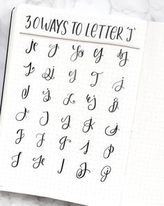 an open notebook with cursive writing on it and the words 30 ways to letter j