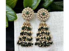 **Kundan Green Moissanite Jhumka Earrings - Elegant Bollywood Wedding Jewelry** Add a touch of timeless elegance to your jewelry collection with these exquisite Kundan Green Moissanite Jhumka Earrings. Perfect for weddings, Bollywood-inspired events, or any festive occasion, these earrings are a stunning example of traditional Indian craftsmanship. **Key Features - **High-Quality Materials Crafted with premium Kundan stones and green moissanite, these earrings offer a radiant sparkle that rivals Green Kundan Chandbalis For Reception, Bollywood Green Bridal Earrings For Reception, Green Meenakari Bridal Earrings For Reception, Green Bridal Earrings For Reception On Diwali, Green Bridal Earrings For Reception During Diwali, Green Bridal Earrings For Reception At Diwali, Green Bridal Earrings For Reception And Festivals, Green Bollywood Chandbalis For Reception, Green Chandbalis For Diwali Reception