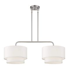 three light chandelier with white shades on the bottom and two lamps above it