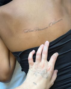 a woman with her hand on the back of her stomach, saying love is passion