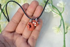 Red panda necklace / Little red panda jewelry / Cute animal necklace Red panda necklace with the little panda made of clay and the cord made of braided nylon. - Polymer clay figurine (Fimo or Cernit) - Braided nylon cord with a shiny finish Dimensions: - Panda 2.5cm*2cm - Cord length 40 cm ATTENTION - This item is not a toy - Not suitable for children under 3 years old - This item is made of polymer clay and therefore remains very fragile. Feel free to message me with your questions before order Cute Adjustable Pendant Jewelry, Cute Nickel-free Round Necklaces, Handmade Cute Polymer Clay Necklaces, Cute Handmade Polymer Clay Necklaces, Cute Personalized Polymer Clay Jewelry, Cute Adjustable Nickel-free Necklace, Unique Red Polymer Clay Necklace, Cute Adjustable Nickel-free Necklaces, Cute Adjustable Necklaces As Gifts