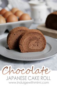 chocolate swiss cake roll on a plate with coffee in the background