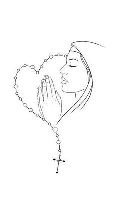 a woman with her hands in the shape of a heart holding a rosary and praying