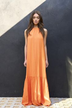 Sleeveless, halter neckline with jewel details, maxi length dress, available in orange. Orange Halter Neck Maxi Dress For Party, Spring Orange Halter Neck Dress, Chic Orange Halter Neck Sleeveless Dress, Orange Sleeveless Maxi Dress For Vacation, Orange Halter Neck Midi Dress For Beach, Orange Halter Neck Midi Dress For Vacation, Orange Halter Neck Maxi Dress For Spring, Orange Halter Neck Sundress Midi Dress, Elegant Orange Maxi Dress For Vacation