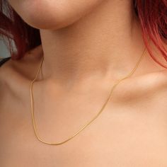 14K Gold Snake Chain Necklace, Choker Herringbone Necklace, Snake Chain Necklace | Silver, Gold, Rose Gold 👀 ❤️The model is wearing the necklace in 16 inches length. ❤️Product Details ❤️Handmade / Handcrafted Fine Jewelry ❤️Metal:14K Gold Filled ❤️Chain Width: Approx. 3mm Colors: Silver Gold Rose Gold Other styles are available in our shop at https://www.etsy.com/shop/GoldPersonalized?ref=seller-platform-mcnav Please contact us if you have any questions or requests/ideas for our shop, we'd love to hear from you! Gold Chain Herringbone Necklace As Gift, Delicate Chain Herringbone Necklace As Gift, Gold Clavicle Chain Charm Necklace With Snake Chain, Clavicle Charm Necklace With Snake Chain, Gold Snake Chain, Herringbone Necklace, Gold Snake, Silver Chain Necklace, Gold Filled Chain