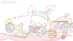 a little bunny reading a book while sitting on the floor next to other books and toys