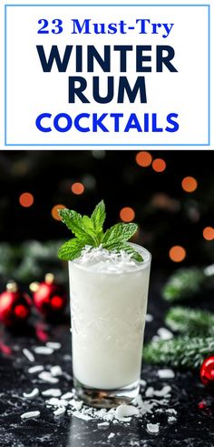 A festive image showing a creamy white rum cocktail topped with fresh mint and shredded coconut, surrounded by holiday decorations like red ornaments and green pine branches. Perfect for winter drink ideas, holiday rum recipes, and cozy party cocktails.